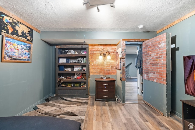 2283 E 7925 S, South Weber, UT 84405 - bedroom with baseboards, a textured ceiling, and wood finished floors