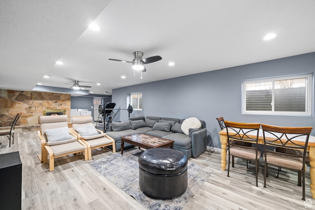 2283 E 7925 S, South Weber, UT 84405 - living area with recessed lighting, a ceiling fan, light wood finished floors, and a fireplace