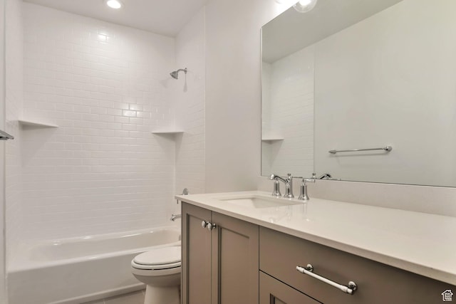 bathroom with recessed lighting, vanity, toilet, and  shower combination