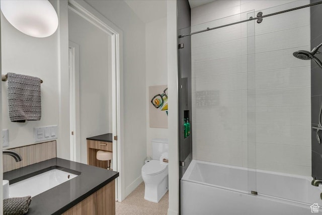 full bathroom with vanity, shower / bath combination with glass door, and toilet