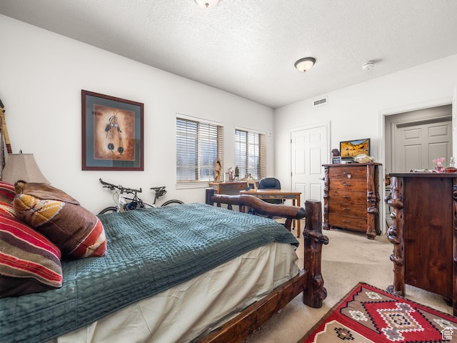 11085 S Grape Arbor Pl Unit 102, Sandy, UT 84070 - bedroom with light colored carpet and a textured ceiling