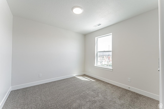 1091 N 3620 W Unit 272, Lehi, UT 84043 - empty room featuring carpet, baseboards, and a textured ceiling