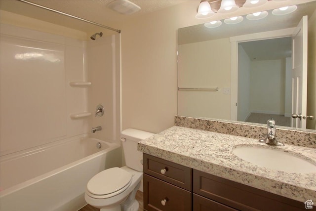 full bathroom with vanity, bathing tub / shower combination, and toilet