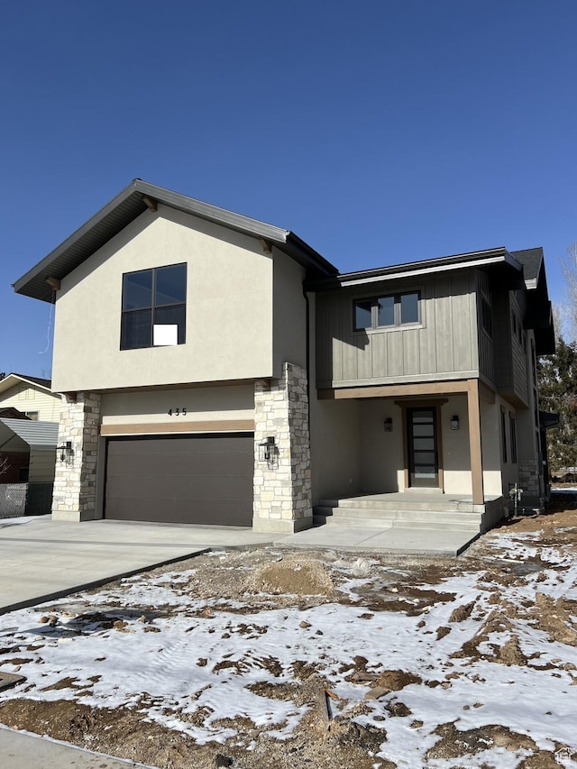 view of front of home with a garage