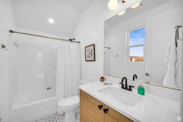 full bathroom featuring vanity, shower / bath combination with curtain, and toilet