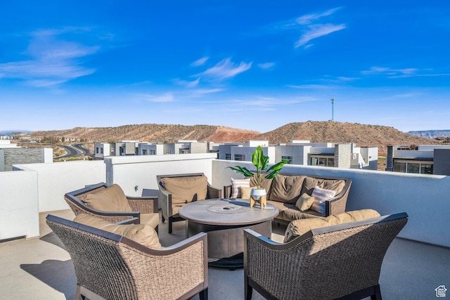 2227 N Double Eagle Ln, Washington, UT 84780 - patio / terrace with a mountain view and an outdoor living space with a fire pit