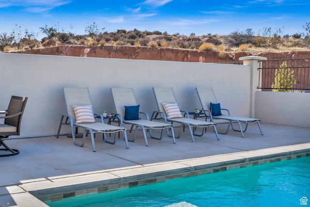 2227 N Double Eagle Ln, Washington, UT 84780 - view of swimming pool featuring a patio