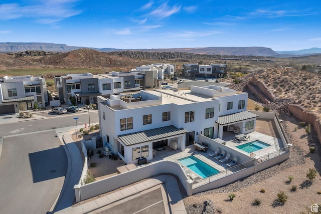 drone / aerial view featuring a mountain view