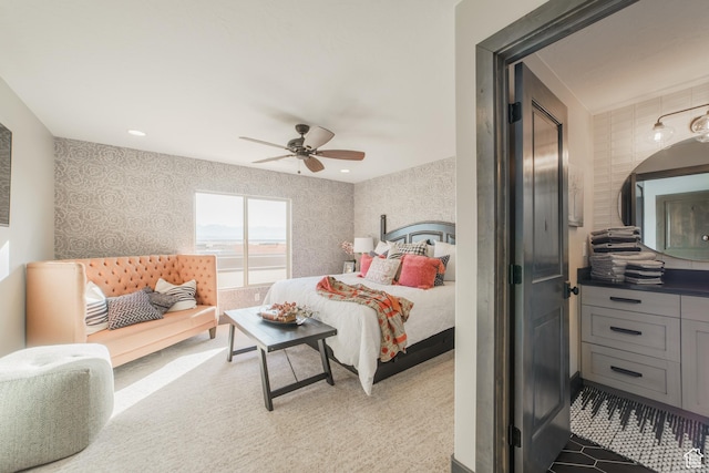 carpeted bedroom featuring ceiling fan