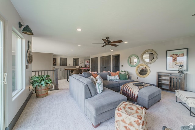 carpeted living room featuring a healthy amount of sunlight