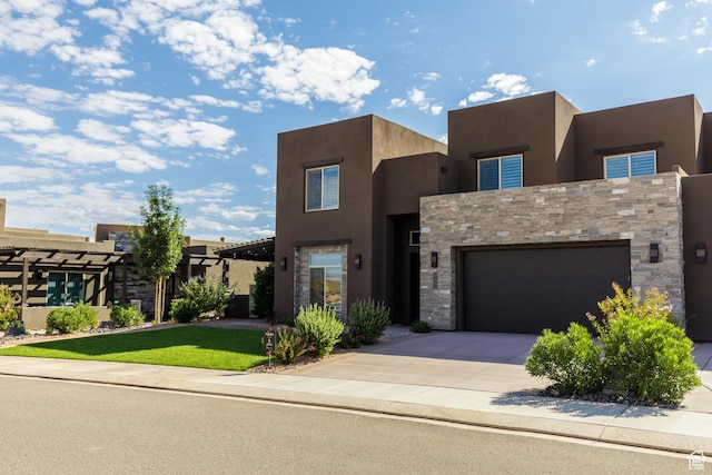 adobe home featuring a garage