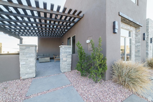 exterior space featuring a pergola