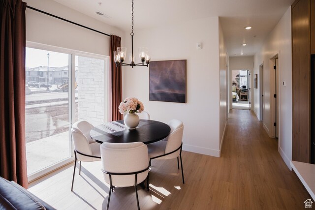858 S 200 E Unit 3-204, Spanish Fork, UT 84660 - dining room with an inviting chandelier and light wood-type flooring