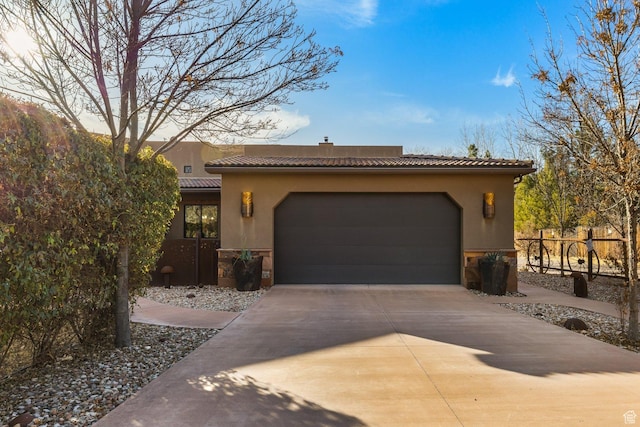 98 Bridge Rd, Rockville, UT 84763 - view of front of home with stucco siding, a tile roof, driveway, and a chimney