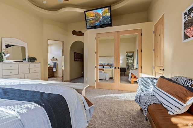 98 Bridge Rd, Rockville, UT 84763 - carpeted bedroom featuring french doors, arched walkways, and a closet