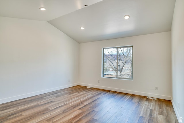 241 E 100 N Unit 3, Moab, UT 84532 - spare room with lofted ceiling and light hardwood / wood-style flooring