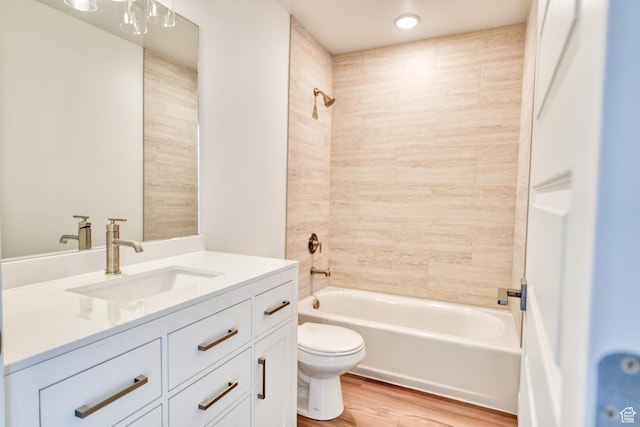 241 E 100 N Unit 3, Moab, UT 84532 - full bathroom with vanity, hardwood / wood-style floors, tiled shower / bath, and toilet