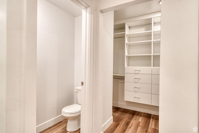241 E 100 N Unit 3, Moab, UT 84532 - bathroom with hardwood / wood-style floors and toilet