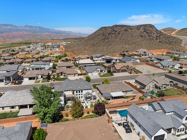 aerial view featuring a mountain view and a residential view