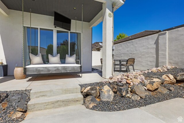 view of patio / terrace with fence