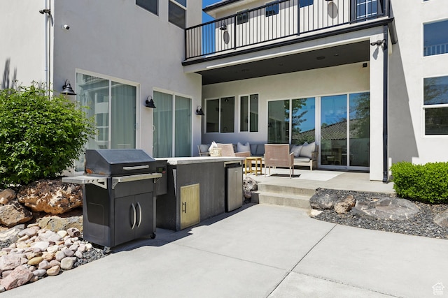 view of patio / terrace featuring a balcony and area for grilling