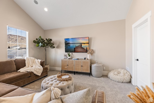 carpeted living area featuring baseboards, recessed lighting, and vaulted ceiling