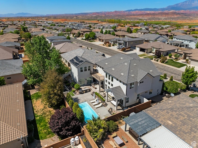 aerial view with a mountain view and a residential view