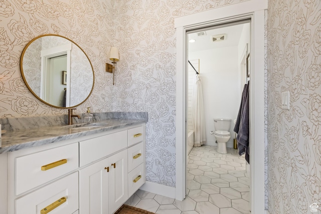full bathroom with shower / bath combination with curtain, vanity, wallpapered walls, and toilet