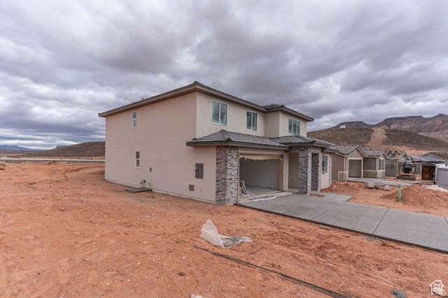 2154 W 3930 S Unit 18, Hurricane, UT 84737 - view of front facade featuring a mountain view and a garage