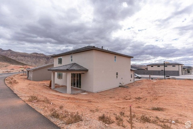 2154 W 3930 S Unit 18, Hurricane, UT 84737 - rear view of house with a mountain view
