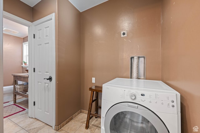 75 N 200 W, Kanab, UT 84741 - washroom featuring light tile patterned flooring and washer / dryer