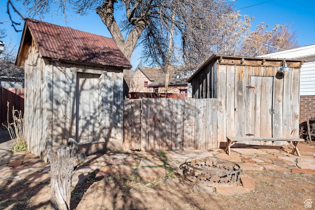 75 N 200 W, Kanab, UT 84741 - exterior space with a storage unit and an outdoor fire pit