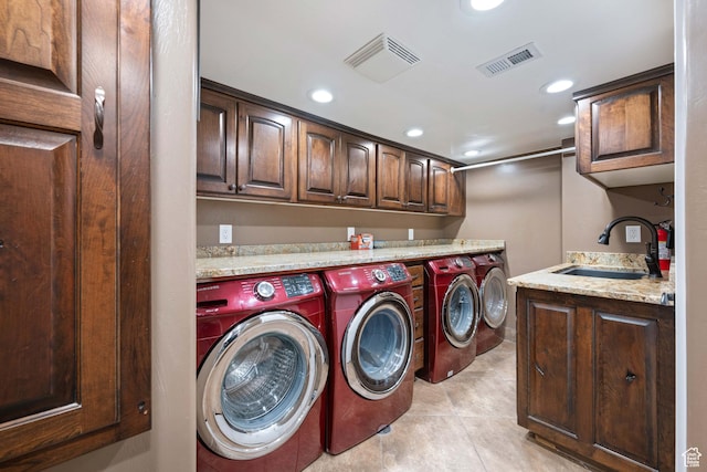 75 N 200 W, Kanab, UT 84741 - washroom with cabinets, light tile patterned flooring, sink, and independent washer and dryer