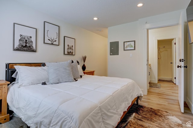 407 S Vasels Rd Unit 8, Brian Head, UT 84719 - bedroom featuring electric panel and light hardwood / wood-style flooring