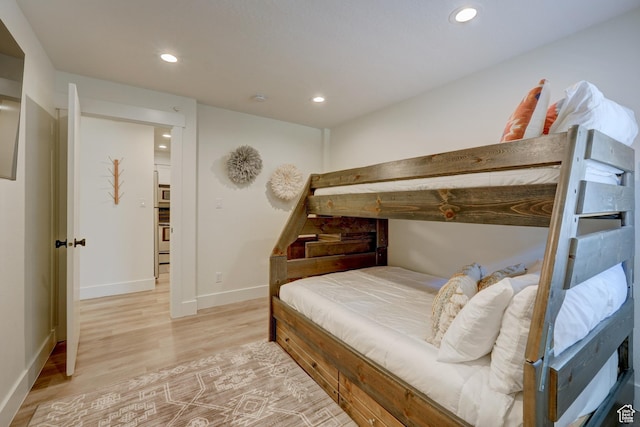 407 S Vasels Rd Unit 8, Brian Head, UT 84719 - bedroom featuring light hardwood / wood-style flooring