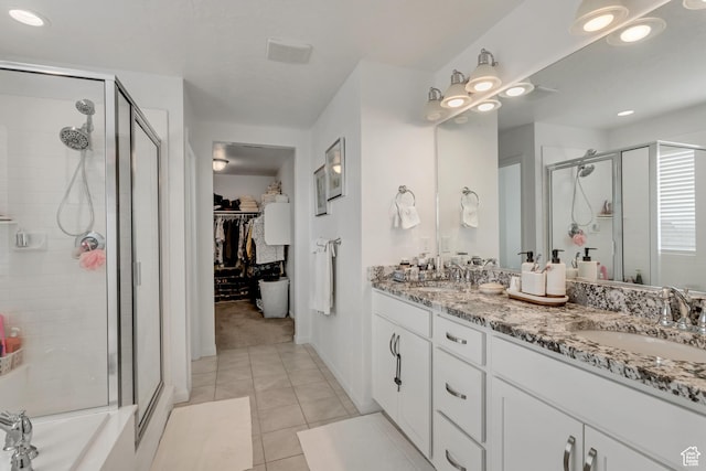739 W Wild Hyacinth Dr, Saratoga Springs, UT 84045 - bathroom with tile patterned flooring, vanity, and an enclosed shower