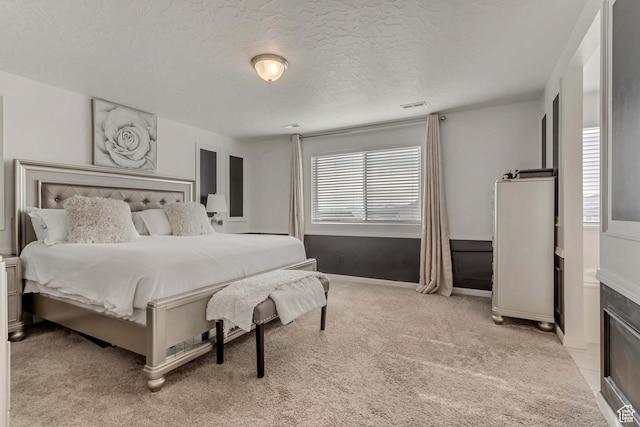 739 W Wild Hyacinth Dr, Saratoga Springs, UT 84045 - bedroom with light colored carpet and a textured ceiling