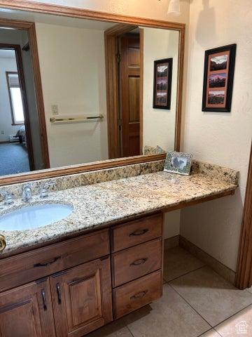 150 W Ridge View St Unit 241, Brian Head, UT 84719 - bathroom with tile patterned flooring and vanity