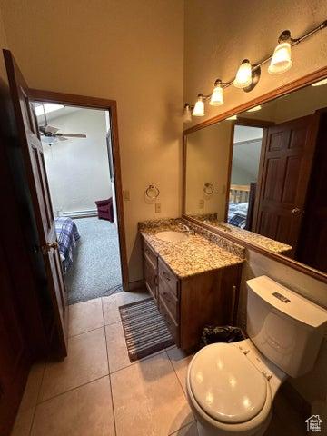 150 W Ridge View St Unit 241, Brian Head, UT 84719 - bathroom featuring vanity, toilet, and tile patterned flooring