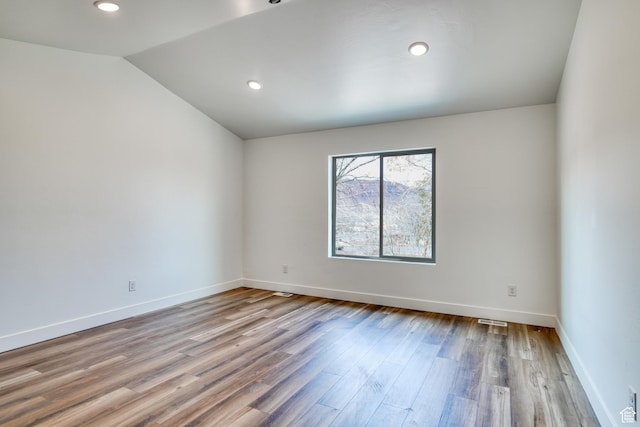 241 E 100 N Unit 4, Moab, UT 84532 - empty room with lofted ceiling and light wood-type flooring