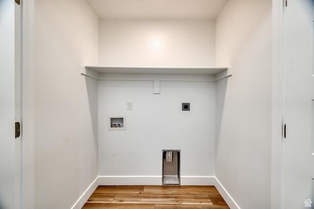 241 E 100 N Unit 4, Moab, UT 84532 - clothes washing area featuring hookup for a washing machine, hookup for an electric dryer, and light hardwood / wood-style flooring