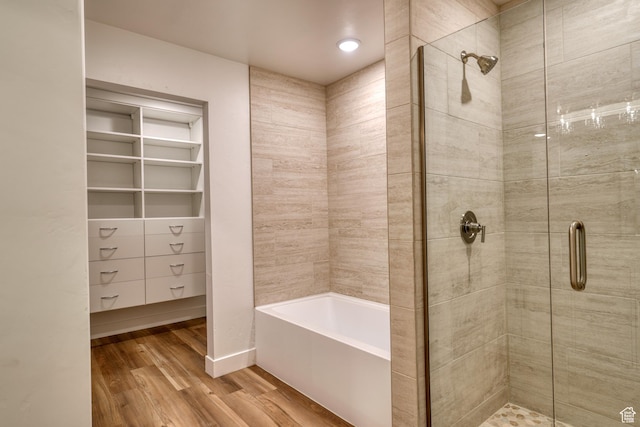 241 E 100 N Unit 4, Moab, UT 84532 - bathroom with separate shower and tub and hardwood / wood-style floors