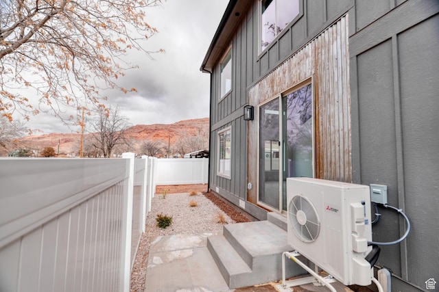 241 E 100 N Unit 4, Moab, UT 84532 - view of property exterior featuring a mountain view and ac unit