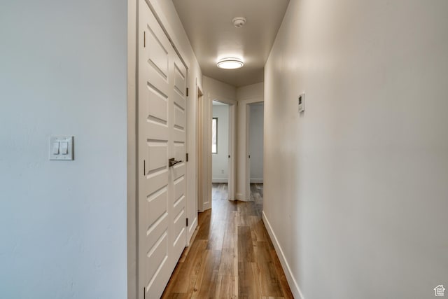 241 E 100 N Unit 4, Moab, UT 84532 - corridor featuring hardwood / wood-style floors