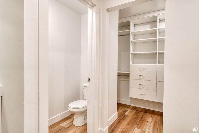 241 E 100 N Unit 4, Moab, UT 84532 - bathroom with wood-type flooring and toilet