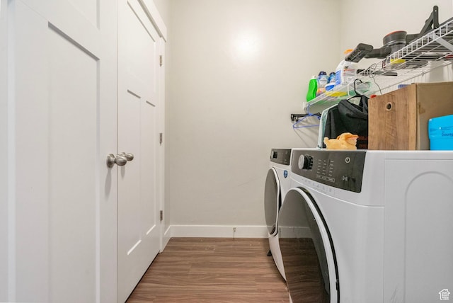 1772 W Tera Vista Ln Unit G302, Saratoga Springs, UT 84045 - laundry area with separate washer and dryer and hardwood / wood-style floors
