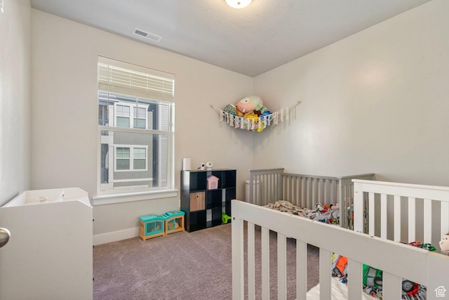 1772 W Tera Vista Ln Unit G302, Saratoga Springs, UT 84045 - carpeted bedroom featuring a nursery area