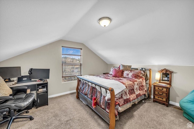 carpeted bedroom featuring vaulted ceiling
