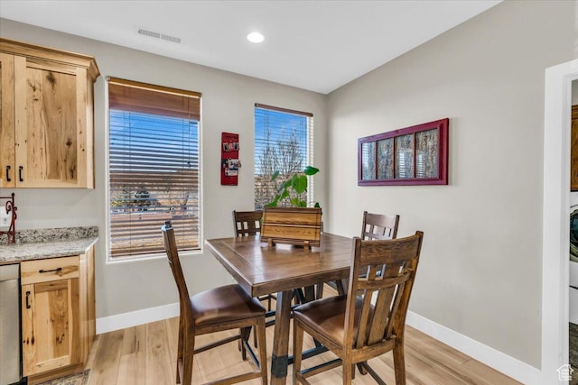 dining room featuring light wood-type flooring