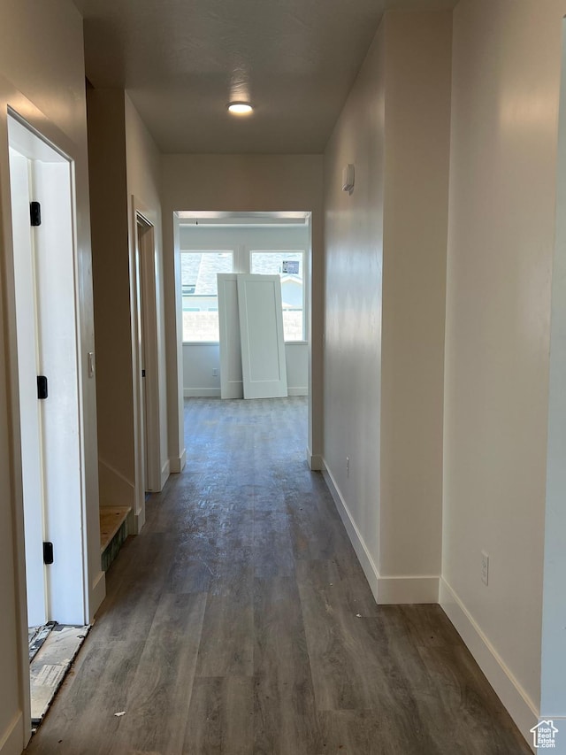 344 W Rosie Loop Unit 46E, Cedar City, UT 84721 - hallway featuring baseboards and wood finished floors